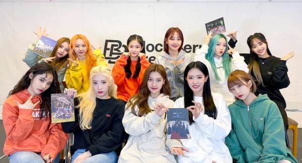 LOONA Group Photo with Printed Photos of Albums
